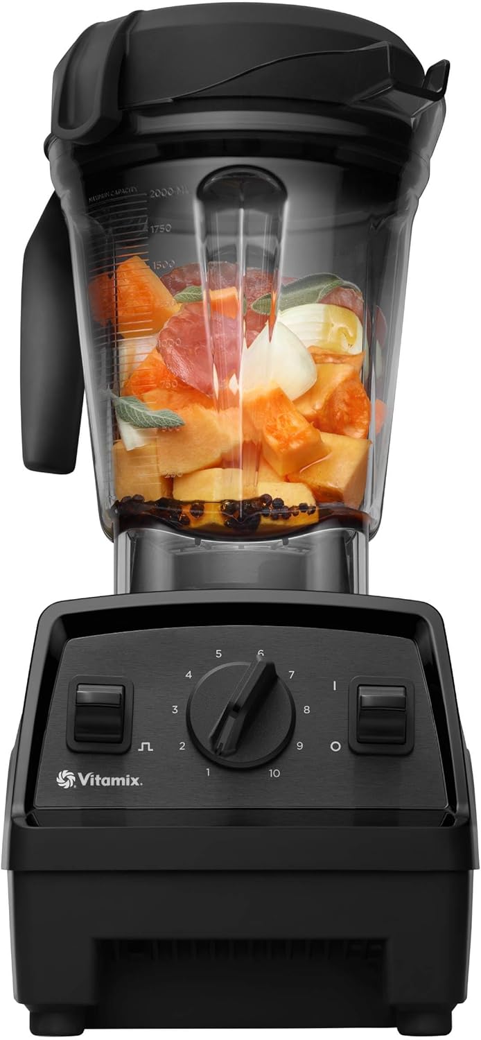 Vitamix Explorian blender fylt med ferske ingredienser, med justerbar hastighetskontroll og robust design.